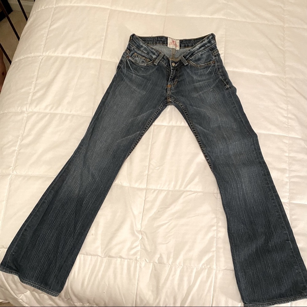 Like new People’s Liberation bootcut jeans.
